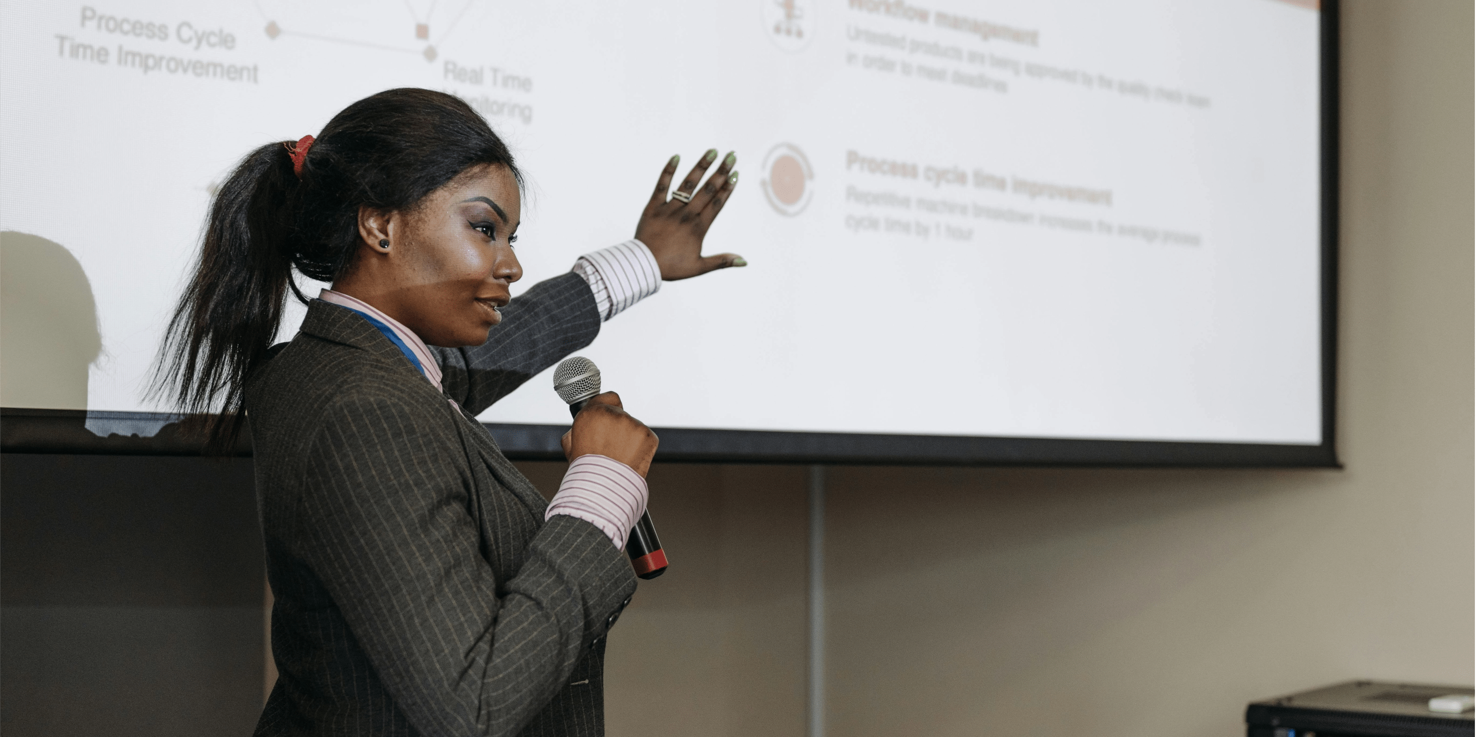 Woman presenting with a microphone